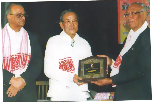 Prof Taid receiving the Basudev Jalan Award from the Asam Sahitya Sabha in 2012.