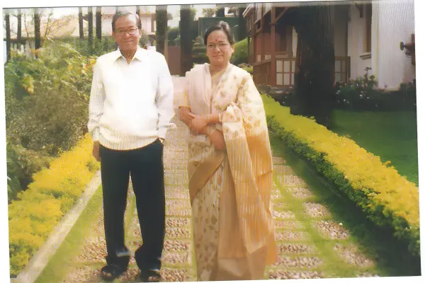 With his wife at Munnar in Kerala.