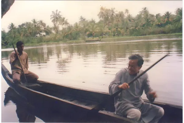 Enjoying a boat ride in the backwaters of Kerala.